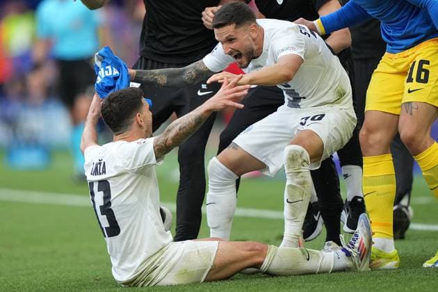 Slovenia s Erik Janza celebrates after scoring 1-1 during the Euro 2024 soccer match between Slovenia and Denmark at the Stuttgart Arena , Stuttgart , Germany - Sunday 16 , June , 2024. - Soccer .  Copyright: xSpada LaPressex