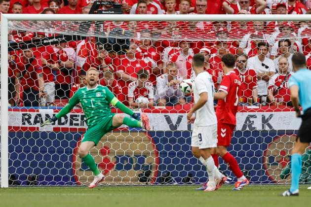 16 06 2024, Football, European Championship, Slovenia Denmark, GER, Stuttgart, Football Arena, Bild v li Goalkeeper Kasper Schmeichel Denmark, 1 is showing the ball from Erik Janza Slovenia, 13 , at the goal, 1 1, Copyright: HMBxMedia xHeikoxBecker