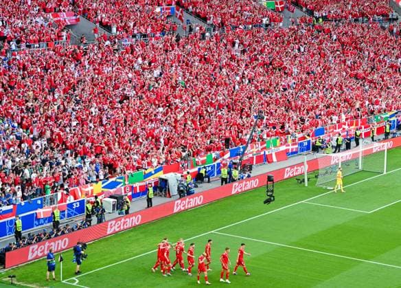 Danish players and fans of Denmark celebrate their teams first goal during the UEFA EURO 2024 Group C match between Slovenia and Denmark, Arena Stuttgart on June 16, 2024 in Stuttgart, Germany Photo by Players of Denmark and Fans of Denmark celebrate their first goal during the UEFA EURO 2024 Group C match between Slovenia and Denmark at Arena Stuttgart on June 16, 2024 in Stuttgart, Germany Photo by Defodi 0581887250st Defodi-