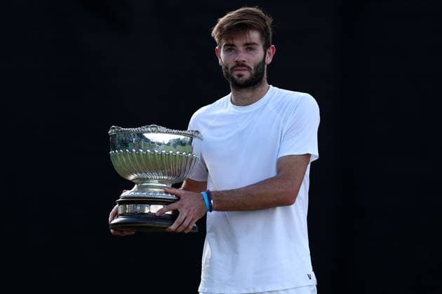 16th June 2024; Lexus Nottingham Tennis Centre, Nottingham, England; Rothesay Nottingham Open, Day 7; Jacob Fearnley celebrates with the mens singles title trophy after he beat Charles Broom by 4-6 6-4 6-3  ActionPlus12655327 ShaunxBrooks