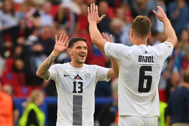Final celebration from left goal scorer Erik JANZA SVN with Jaka BIJOL SVN , cheering,joy,enthusiasm,action, group stage Group C Slovenia SVN Denmark DEN 1 1 on 16 06 2024, Stuttgart Arena Football UEFA EURO 2024 GERMANY from 14 06 2024 14 07 2024