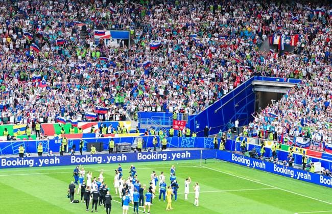 Cheering fans of Slovenia during the UEFA EURO 2024 Group C match between Slovenia and Denmark, Arena Stuttgart on June 16, 2024 in Stuttgart, Germany Photo by Slovenian Fans cheer to their team during the UEFA EURO 2024 Group C match between Slovenia and Denmark at Arena Stuttgart on June 16, 2024 in Stuttgart, Germany Photo by Defodi 0581909434st Defodi-
