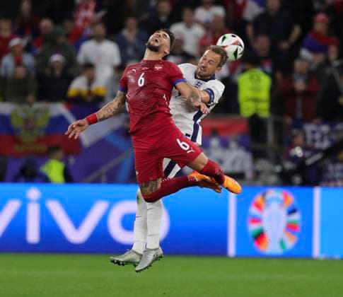 Serbia v England UEFA EURO, EM, Europameisterschaft,Fussball 2024 Group C Nemanja Gudelj of Serbia battles for the header with Harry Kane of England during the UEFA Euro 2024 Group C match between Serbia and England at Veltins-Arena, Gelsenkirchen Copyright: xPaulxChestertonx FIL-20270-0085 UK Newspapers OUT