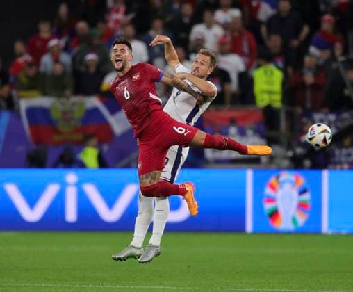 Serbia v England UEFA EURO, EM, Europameisterschaft,Fussball 2024 Group C Nemanja Gudelj of Serbia battles for the header with Harry Kane of England during the UEFA Euro 2024 Group C match between Serbia and England at Veltins-Arena, Gelsenkirchen Copyright: xPaulxChestertonx FIL-20270-0087 UK Newspapers OUT