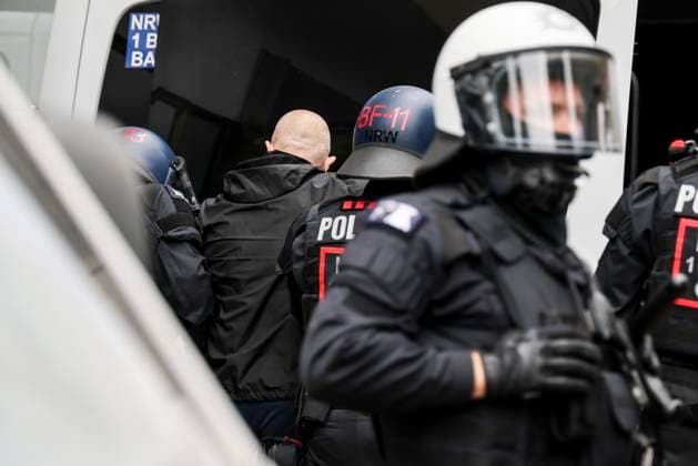 16 06 2024 , Gelsenkirchen, Euro 2024, Fans in Gelsenkirchen at England v Serbia match Police officers arrest English fans who were previously involved in an attack on a Serbian restaurant