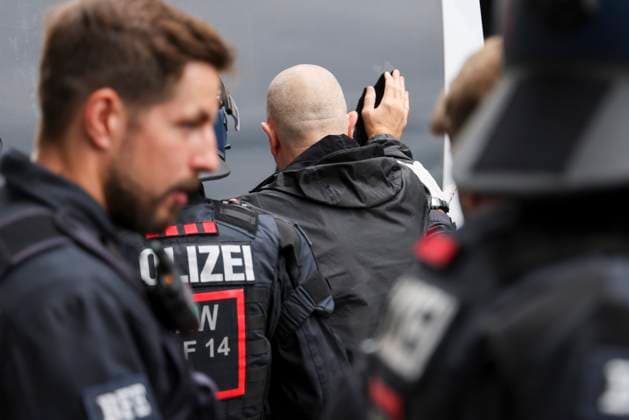 16 06 2024 , Gelsenkirchen, Euro 2024, Fans in Gelsenkirchen at England v Serbia match Police officers arrest English fans who were previously involved in an attack on a Serbian restaurant