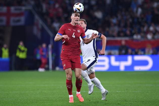 Soccer UEFA EURO 2024 Group Stage 1 Matchday Serbia England on 16 06 2024 at Arena AufSchalke in Gelsenkirchen Nikola Milenkovic Serbia , front Harry Kane England , back xRx