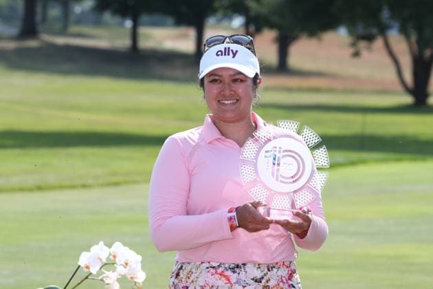 GRAND RAPIDS, MI - JUNE 16: LPGA, Golf Damen golfer Lilia Vu poses for a photo with the trophy after winning the LPGA Meijer LPGA Classic for Simply Give on June 16th, 2024, at Blythefield Country Club in Grand Rapids, Michigan. (Photo by Brian Spurlock Icon Sportswire) GOLF: JUN 16 LPGA Meijer LPGA Classic for Simply Give EDITORIAL USE ONLY Icon24061619