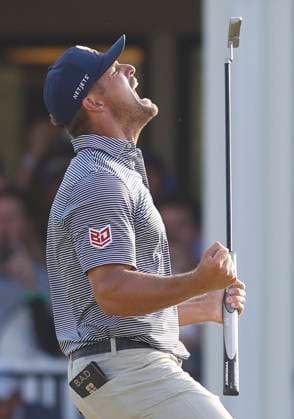Bryson DeChambeau celebrates after winning the 124th U.S. Open golf championship at Pinehurst Resort & Country Club in Pinehurst, N.C. on Sunday, June 16, 2024. DeChambeau won with a six-under-par score of 274.  NCP20240616355 JOHNxANGELILLO