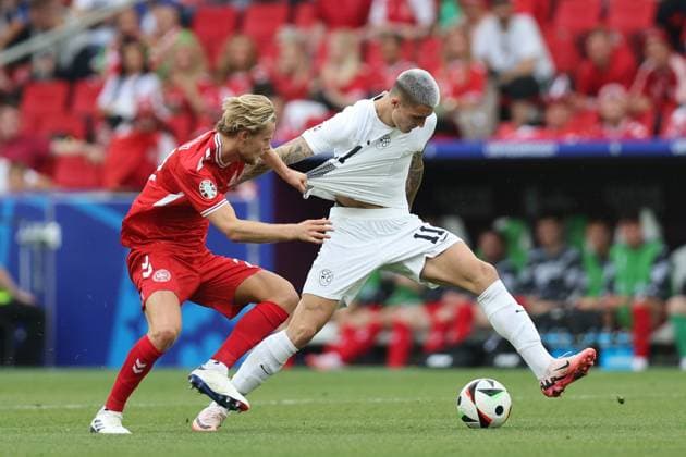 Benjamin Sesko (Slovenia)Morten Hjulmand (Denmark) during the UEFA EURO, EM, Europameisterschaft,Fussball Germany 2024 match between Slovenia 1-1 Denmark at Stuttgart Arena on June 16, 2024 in Stuttgart , Germany. Noxthirdxpartyxsales  (256646109)