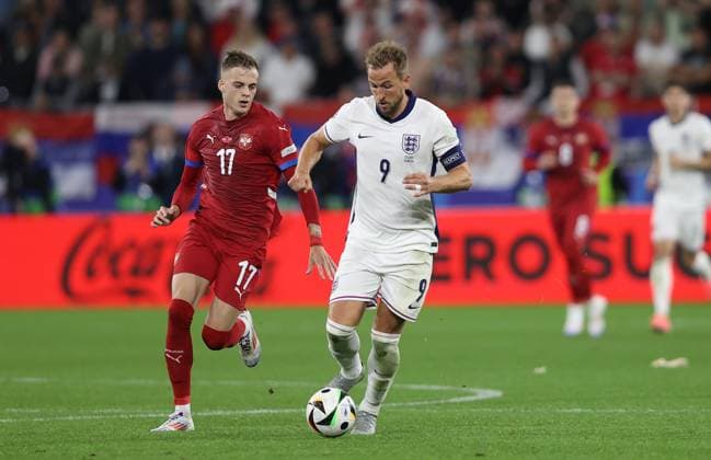 - Serbia v England, UEFA EURO, EM, Europameisterschaft,Fussball 2024, Group Stage, Group C, Arena AufSchalke, Gelsenkirchen, Germany - 16th June 2024. Harry Kane of England battles Ivan Ilic of Serbia. - Serbia v England, UEFA Euro 2024, Group Stage, Group C, Arena AufSchalke, Gelsenkirchen, Germany - 16th June 2024. Gelsenkirchen Arena AufSchalke, Veltins Arena Germany Copyright: xDanxWeirx CP_Serbia_England_0047