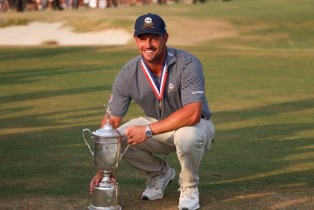 Bryson DeChambeau of the United States poses for a photo with the championship trophy after winning the 124th US Open golf championship at Pinehurst Resort & Country Club in Pinehurst, N.C. on Sunday, June 16, 2024.  NCP20240616841 VeaseyxConway