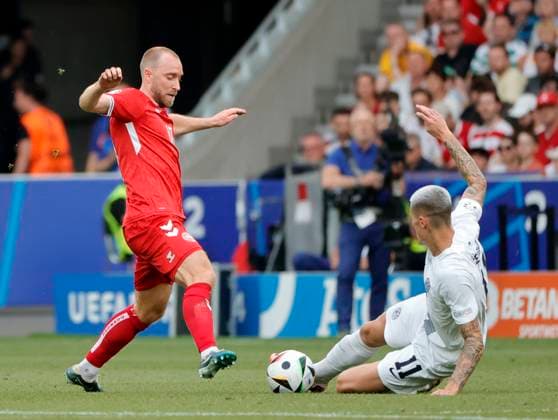 (240617) -- STUTTGART, June 17, 2024 -- Christian Eriksen (L) of Denmark vies against Benjamin Sesko of Slovenia during the UEFA EURO, EM, Europameisterschaft,Fussball 2024 Group C match between Denmark and Slovenia in Stuttgart, Germany on June 16, 2024. (Photo by Xinhua) (SP)GERMANY-STUTTGART-FOOTBALL-EURO 2024-DENMARK VS SLOVENIA PhilippexRuiz 