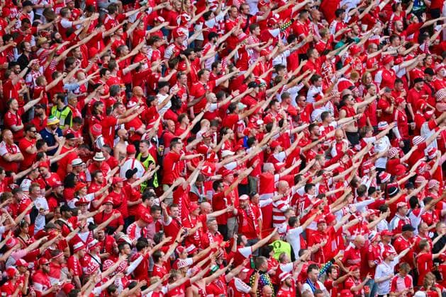 Fans of Denmark cheer on their team during the UEFA EURO 2024 Group C match between Slovenia and Denmark at Arena Stuttgart on June 16, 2024 in Stuttgart, Germany Photo by Denmark fans cheer on their team during the UEFA EURO 2024 Group C match between Slovenia and Denmark at Arena Stuttgart on June 16, 2024 in Stuttgart, Germany Photo by Defodi 0582007652st Defodi-