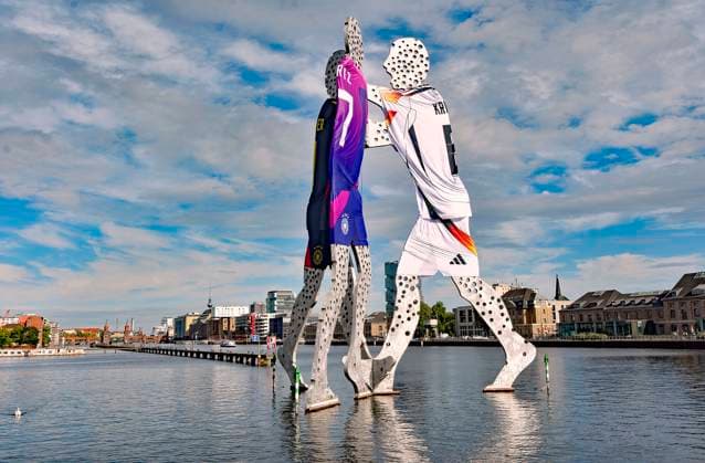 EURO 2024, Citydressing Berlin, sculpture Molecule Man in the various Germany jerseys