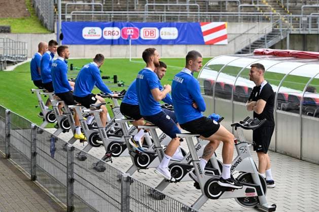 GER, UEFA European Championship 2024, Slovenian Base Camp Wuppertal 17 06 2023,Wuppertal ,Stadion am Zoo, GER, UEFA European Championship 2024, Slovenian Base Camp Wuppertal in the picture Banjamin Sesko SVN 11 and the colleagues Regeneration on the bike NordphotoxGmbHx xFreund nph00018