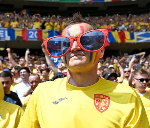 17 06 2024, Football UEFA EURO 2024, Preliminary round, Match 10, Romania Ukraine, at the Football Arena Munich A Romanian fan with glasses