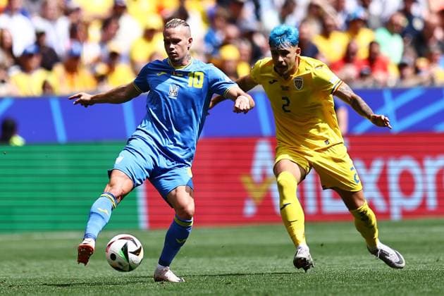 Mykhaylo Mudryk of Ukraine and Andrei Raiu of Romania Romania v Ukraine, UEFA European Championship, EM, Europameisterschaft 2024, Group E, Football, Munich Football Arena, Munich, Germany, 17 Jun 2024 EDITORIAL USE ONLY No use with unauthorised audio, video, data, fixture lists, club league logos or live services. Online in-match use limited to 120 images, no video emulation. No use in betting, games or single club league player publications.  Copyright: xMichaelxZemanek Shutterstockx 14539636s