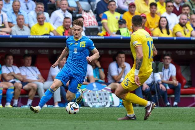 in duel, action, with Viktor Tsygankov 15 Ukarine , Andrei Burca 15 Romaenien , Romania vs Ukraine football, UEFA Euro 2024, group stage, matchday 1, 17 06 2024 Munich Bavaria Germany Copyright: xkolbert-press ChristianxKolbertx