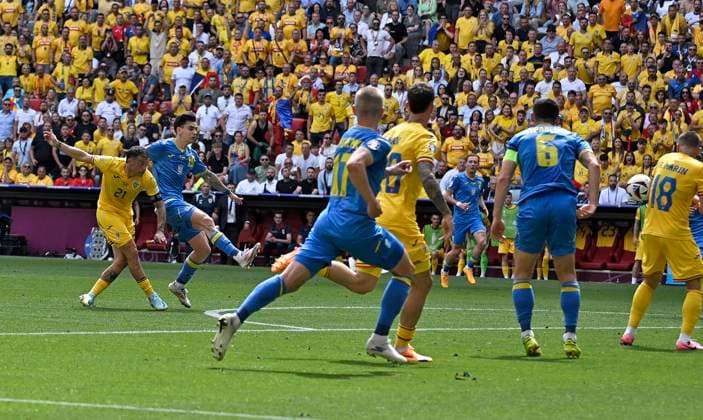 17 06 2024, Football UEFA EURO 2024, Preliminary round, Match 10, Romania Ukraine, at Fußball Arena München Nicolae Stanciu Romania scores to make it 1 0