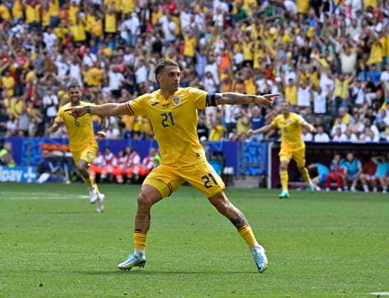 17 06 2024, Football UEFA EURO 2024, Preliminary round, Match 10, Romania Ukraine, at the Fußball Arena München Nicolae Stanciu Romania scores to make it 1-0 and cheers here