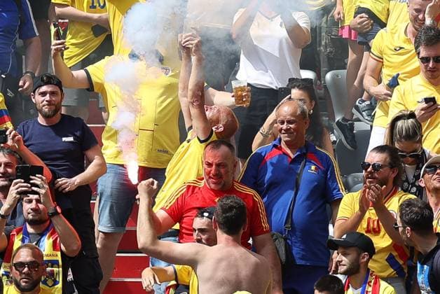 A Romania fan with pyro, Romania vs Ukraine football, UEFA Euro 2024, group stage, matchday 1, 17 06 2024 Munich Bavaria Germany Copyright: xkolbert-press ChristianxKolbertx