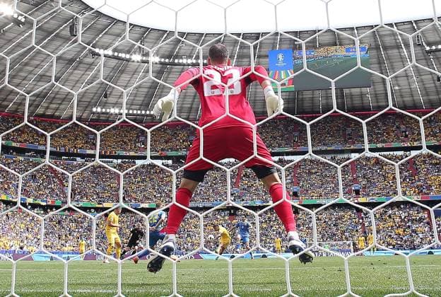 Nicolae Stanciu of Romania scores the opening goal Romania v Ukraine, UEFA European Championship, EM, Europameisterschaft 2024, Group E, Football, Munich Football Arena, Munich, Germany, 17 Jun 2024 EDITORIAL USE ONLY No use with unauthorised audio, video, data, fixture lists, club league logos or live services. Online in-match use limited to 120 images, no video emulation. No use in betting, games or single club league player publications. Copyright: xMichaelxZemanek Shutterstockx 14539636ai