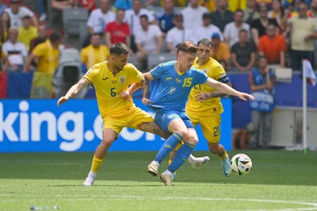 Marius MARIN ROM , action,duel against Viktor TSYGANOV UKR group stage group C Romania ROU Ukraine UKR on 17 06 2024 Football Arena Munich, Football UEFA EURO 2024 GERMANY from 14 06 2024 14 07 2024