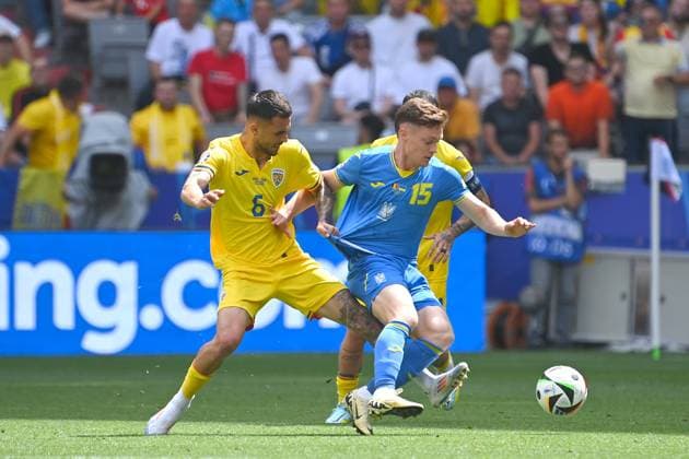 Marius MARIN ROM , action,duel against Viktor TSYGANOV UKR group stage group C Romania ROU Ukraine UKR on 17 06 2024 Football Arena Munich, Football UEFA EURO 2024 GERMANY from 14 06 2024 14 07 2024