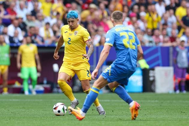 in duel, action, with Andrei Ratiu 2 Romaenien , Mykola Matvienko 22 Ukarine , Romania vs Ukraine Football, UEFA Euro 2024, Group stage, Matchday 1, 17 06 2024 Munich Bavaria Germany Copyright: xkolbert-press ChristianxKolbertx