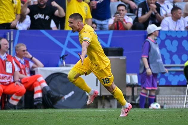 Picture shows goal celebration Romania, R Marin 18, Romania , 17 06 2024, Munich, Soccer, European Championship, Romania Ukraine, EVENT REGULATIONS PROHIBIT ANY USE OF PHOTOGRAPHS AS IMAGE SEQUENCES AND OR QUASI VIDEO xklx