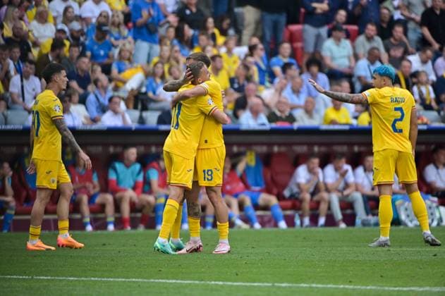 Picture shows goal celebration Romania, Bancu 11, Romania , Dragus 19, Romania , 17 06 2024, Munich, Soccer, European Championship, Romania Ukraine, EVENT REGULATIONS PROHIBIT ANY USE OF PHOTOGRAPHS AS IMAGE SEQUENCES AND OR QUASI VIDEO xklx