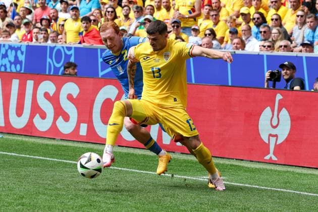 in duel, action, with Yukhym Konoplya 2 Ukarine , Valentin Mihaila 13 Romaenia , Romania vs Ukraine Football, UEFA Euro 2024, Group stage, Matchday 1, 17 06 2024 Munich Bavaria Germany Copyright: xkolbert-press ChristianxKolbertx