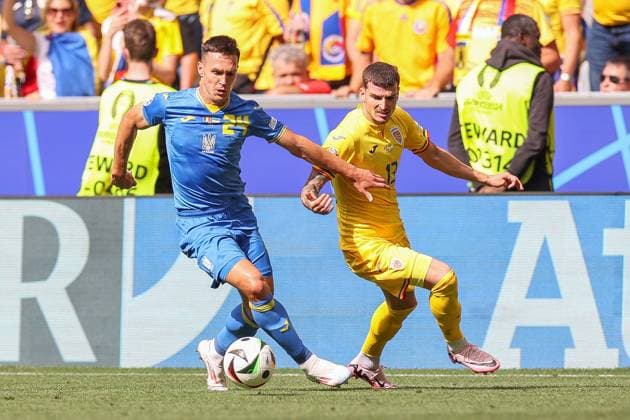 Soccer UEFA EURO 2024 Group Stage 1 Matchday Romania Ukraine on 17 06 2024 at the Munich Football Arena in Munich Oleksandr Tymchyk Ukraine , left Valentin Mihaila Romania , right xMSx