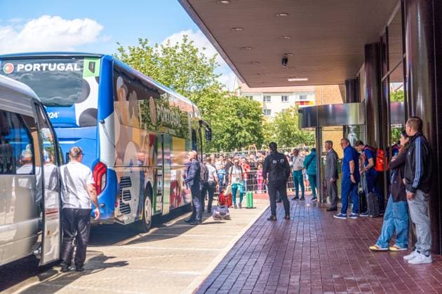 Arrival of Portugals national soccer team at the Westin Hotel before their preliminary round match against the Czech Republic in Leipzigs Central Stadium Around 250 people waited outside the hotel to catch a glimpse of the stars, but they didnt give the fans a second glance Arrival Portugal