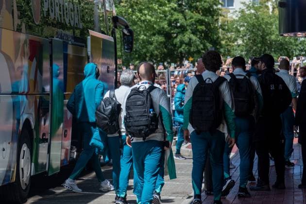 Arrival of Portugals national soccer team at the Westin Hotel before their preliminary round match against the Czech Republic in Leipzigs Central Stadium Around 250 people waited outside the hotel to catch a glimpse of the stars, but they didnt give the fans a second glance Arrival Portugal
