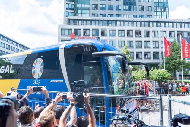 Arrival of Portugals national soccer team at the Westin Hotel before their preliminary round match against the Czech Republic in Leipzigs Central Stadium Around 250 people waited outside the hotel to catch a glimpse of the stars, but they didnt give the fans a second glance Arrival Portugal