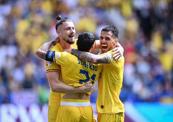 Football Euro 2024 Group E 17 06 2024 Romania Ukraine CHEERS Romania goal scorer for 1 0 Nicolae Stanciu center embraced by Radu Dragusin left and Marius Marin right