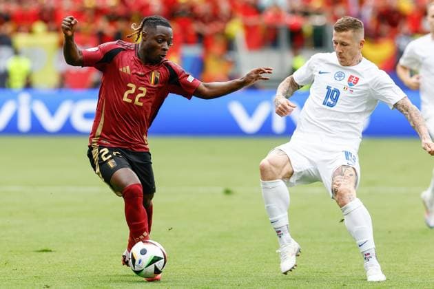 FRANKFURT, Arena Frankfurt, 17-06-2024 , European Football Championship Euro2024, Group stage match no.9 between Belgium and Slovakia. Belgium player Jeremy Doku and Slovakia player Juraj Kucka Belguim - Slovakia (Euro2024)  x25517699x Copyright: