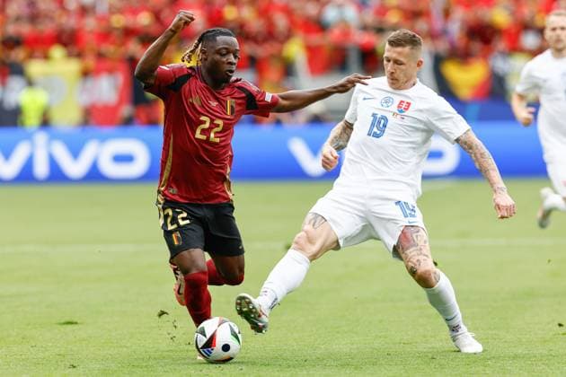 FRANKFURT, Arena Frankfurt, 17-06-2024 , European Football Championship Euro2024, Group stage match no.9 between Belgium and Slovakia. Belgium player Jeremy Doku and Slovakia player Juraj Kucka Belguim - Slovakia (Euro2024)  x25517700x Copyright: