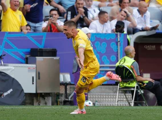 (240617) -- MUNICH, June 17, 2024 -- Razvan Marin of Romania celebrates scoring during the UEFA EURO, EM, Europameisterschaft,Fussball 2024 Group E match between Romania and Ukraine in Munich, Germany, on June 17, 2024. (Photo by Xinhua) (SP)GERMANY-MUNICH-FOOTBALL-EURO 2024-ROMANIA VS UKRAINE PhilippexRuiz 