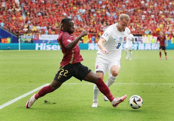 Jeremy Doku of Belgium and Ondrej Duda of Slovakia Belgium v Slovakia, UEFA European Championship, EM, Europameisterschaft 2024, Group E, Football, Frankfurt Arena, Frankfurt, Germany, 17 Jun 2024 EDITORIAL USE ONLY No use with unauthorised audio, video, data, fixture lists, club league logos or live services. Online in-match use limited to 120 images, no video emulation. No use in betting, games or single club league player publications. Copyright: xPaulxCurrie Shutterstockx 14539658ap