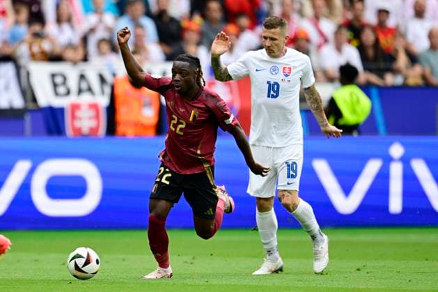 Belgium v Slovakia Group E - UEFA EURO, EM, Europameisterschaft,Fussball 2024 FRANKFURT AM MAIN, GERMANY - JUNE 17 : Doku Jeremy forward of Belgium and Juraj Kucka midfielder of Slovakia in action during the UEFA EURO 2024 European Football Championship tournament group E stage match between Belgium and Slovakia at Frankfurt Arena on June 17, 2024 in Frankfurt am Main, Germany, 17 06 2024 Frankfurt am Main Germany  Copyright: xPeterxDexVoechtx