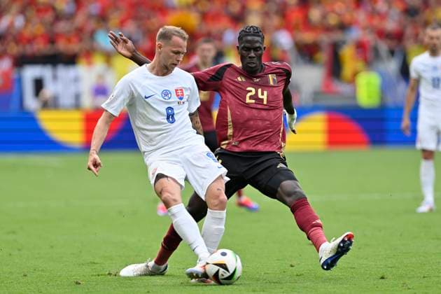 Belgium v Slovakia Group E - UEFA EURO, EM, Europameisterschaft,Fussball 2024 FRANKFURT AM MAIN, GERMANY - JUNE 17 : Ondrej Duda midfielder of Slovakia and Onana Amadou midfielder of Belgium during the UEFA EURO 2024 European Football Championship tournament group E stage match between Belgium and Slovakia at Frankfurt Arena on June 17, 2024 in Frankfurt am Main, Germany, 17 06 2024 Frankfurt am Main Germany  Copyright: xDhax
