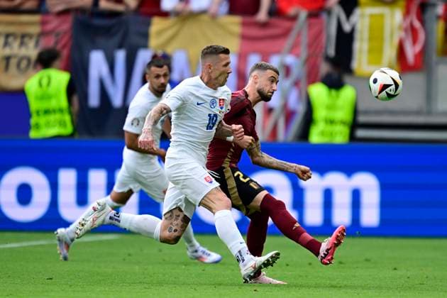 Belgium v Slovakia Group E - UEFA EURO, EM, Europameisterschaft,Fussball 2024 FRANKFURT AM MAIN, GERMANY - JUNE 17 : Debast Zeno defender of Belgium is fighting for the ball with Juraj Kucka midfielder of Slovakia during the UEFA EURO 2024 European Football Championship tournament group E stage match between Belgium and Slovakia at Frankfurt Arena on June 17, 2024 in Frankfurt am Main, Germany, 17 06 2024 Frankfurt am Main Germany  Copyright: xPeterxDexVoechtx