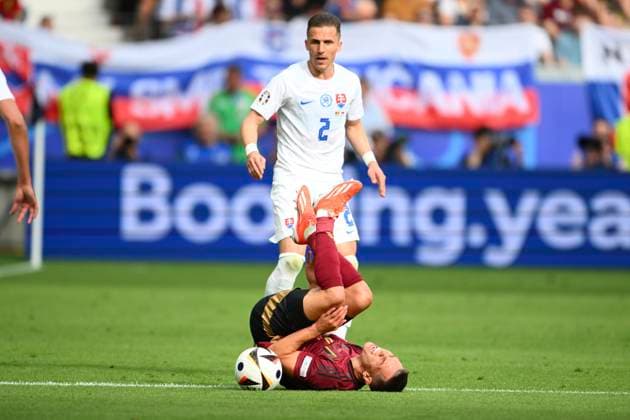Belgium v Slovakia Group E - UEFA EURO, EM, Europameisterschaft,Fussball 2024 FRANKFURT AM MAIN, GERMANY - JUNE 17 : Trossard Leandro forward of Belgium and Peter Pekarik defender of Slovakia during the UEFA EURO 2024 European Football Championship tournament group E stage match between Belgium and Slovakia at Frankfurt Arena on June 17, 2024 in Frankfurt am Main, Germany, 17 06 2024 Frankfurt am Main Germany  Copyright: xVincentxKalutx