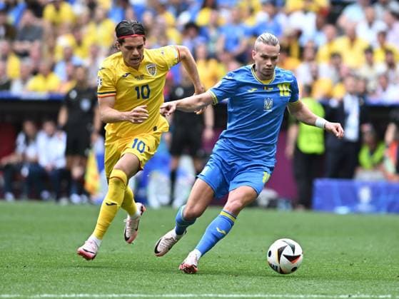 Ianis Hagi and Mykhailo Mudryk in the UEFA EURO 2024 match between Romania and Ukraine at the Fussball Arena in Munich, Monday 17 June 2024 Munich Copyright: xRazvanxPasarica SPORTxPICTURESx