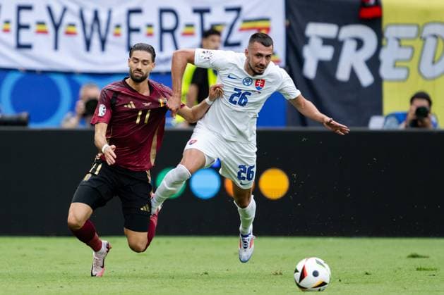240617 Yannick Carrasco of Belgium and Ivan Schranz of Slovakia during the UEFA Euro 2024 Football Championship match between Belgium and Slovakia on June 17, 2024 in Frankfurt Photo Mathias Bergeld BILDBYRAN code MB MB0937 fotboll football soccer fotballs em europamästerskap em uefa euro uefa european football championship euro 2024 belgien belgium slovakien slovakia bbeng  Copyright: MATHIASxBERGELD BB240617MB065