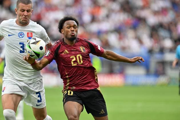 240617 EURO2024 BELGIUM VS SLOVAKIA Denis Vavro (3) of Slovakia defending on Lois Openda (20) of Belgium during a soccer game between the national teams of Belgium, called the Red Devils and Slovakia on the first matchday in Group E in the group stage of the UEFA EURO, EM, Europameisterschaft,Fussball 2024 tournament , on Monday 17 June 2024 in Frankfurt , Germany . PHOTO SPORTPIX David Catry FRANKFURT GERMANY  Copyright: xx 463809