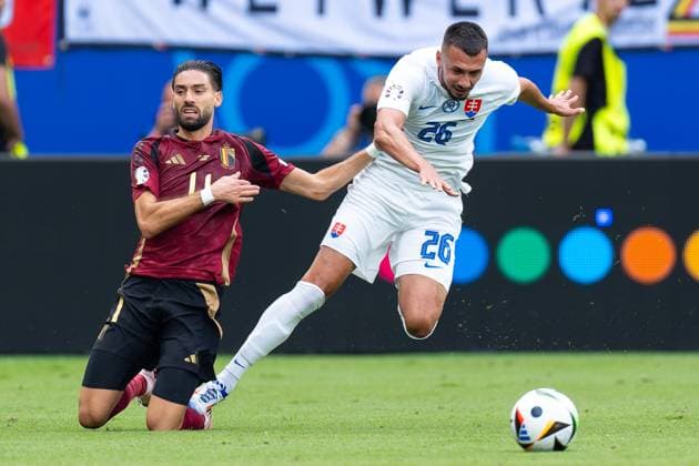 2024-06-17 Belgium v Slovakia - Group E - UEFA EURO, EM, Europameisterschaft,Fussball 2024 FRANKFURT, GERMANY - JUNE 17: Yannick Carrasco of Belgium battles for the ball with Ivan Schranz of Slovakia during the Group E - UEFA EURO 2024 match between Belgium and Slovakia at Deutsche Bank Park on June 17, 2024 in Frankfurt, Germany. (Photo by Joris Verwijst BSR Agency) Frankfurt Germany Content not available for redistribution in The Netherlands directly or indirectly through any third parties. Copyright: xBSRxAgencyx